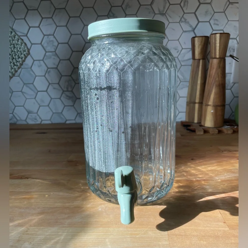 IKEA Clear Glass Beverage Dispenser with Green Lid and Spout